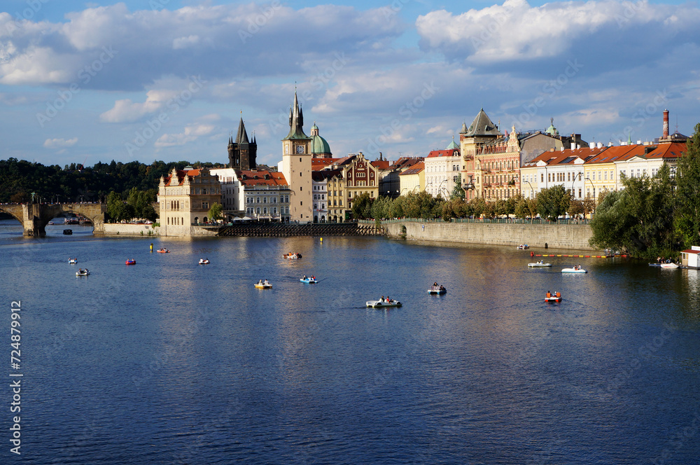 View of a lake and old architecture in Prague. 