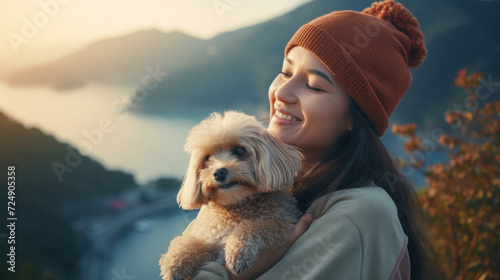 girl with toller dog in the mountains. Autumn mood. Traveling with a pet.