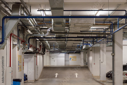 underground parking with utilities and cars from the inside