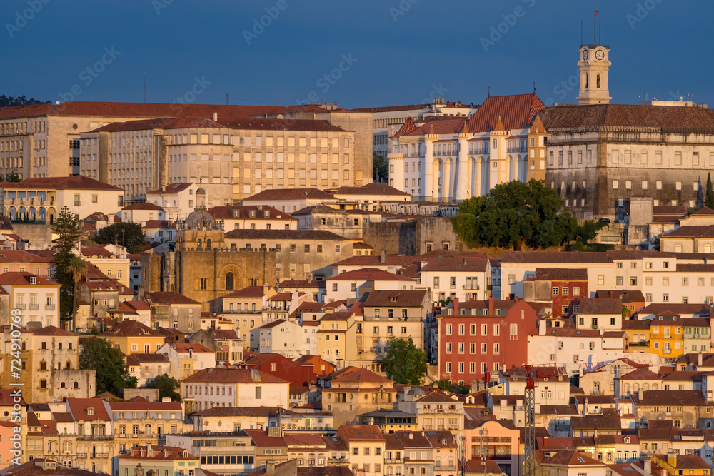 Aerial view of the beautiful city of Coimbra in a sunny day at sunset. Portugal.