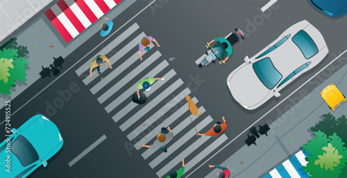 Cars and motorcycles stop to let people cross in a zebra crossing.
