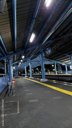 The atmosphere of the train station is quiet and calm at night in Jakarta
