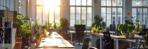 An isolated creative office space with windows, devoid of people, with emphasis on the back button focus.