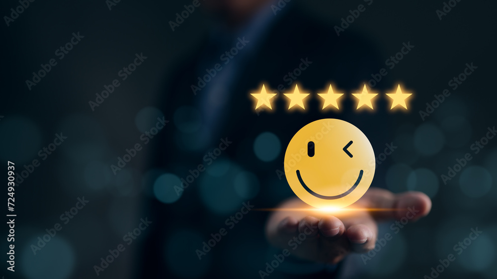 © Supatman - Customer review satisfaction feedback survey concept. Best Excellent Services Rating for Satisfaction present by Hand of Client Showing face with excellent rating Five Star. Customer experience,