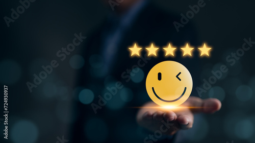 Customer review satisfaction feedback survey concept. Best Excellent Services Rating for Satisfaction present by Hand of Client Showing smile face with excellent rating Five Star. Customer experience,