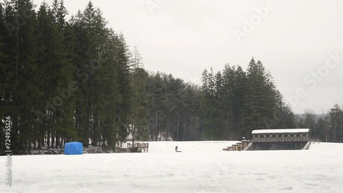 Bradford Pennsylvania USA January 23 2024: Marilla reservoir People fishing on ice photo