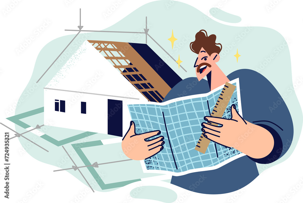 Man architect holds construction drawings, standing near house model ...