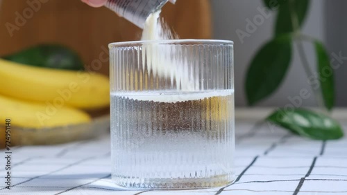 Collagen powder dissolves in a glass of water, Bioactive additives photo