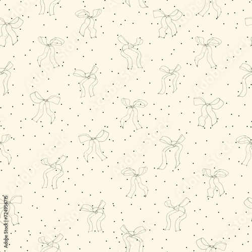 Coquette cream bows on a cream and black polka dot background pattern