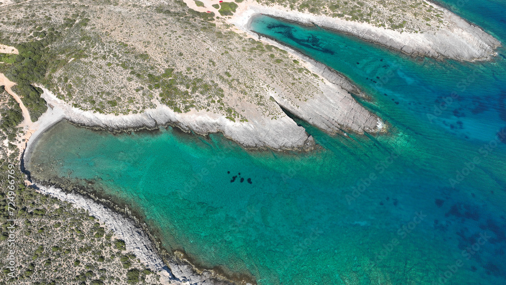 Aerial drone photo of beautiful turquoise beach and cave formations visited by yachts and sailboats in Southern part of Antiparos island, Cyclades, Greece Aerial drone photo of beautiful turquoise beach and cave formations visited by yachts and sailboats in Southern part of Antiparos island, Cyclades, Greece