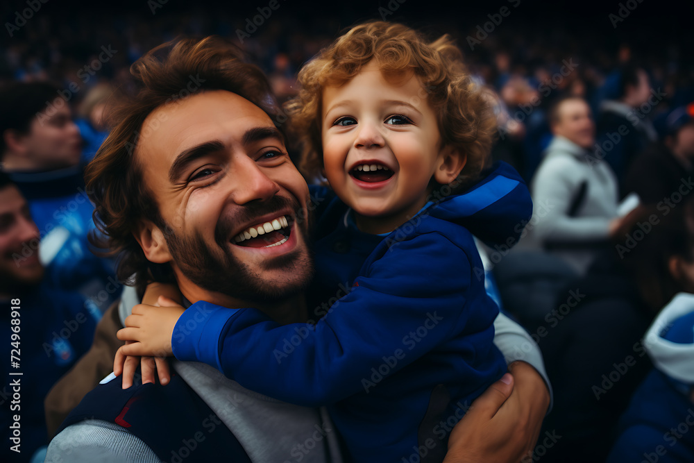 father and son in the stands of a sports stadium in a cheerful attitude at a sporting event father and son in the stands of a sports stadium in a cheerful attitude at a sporting event