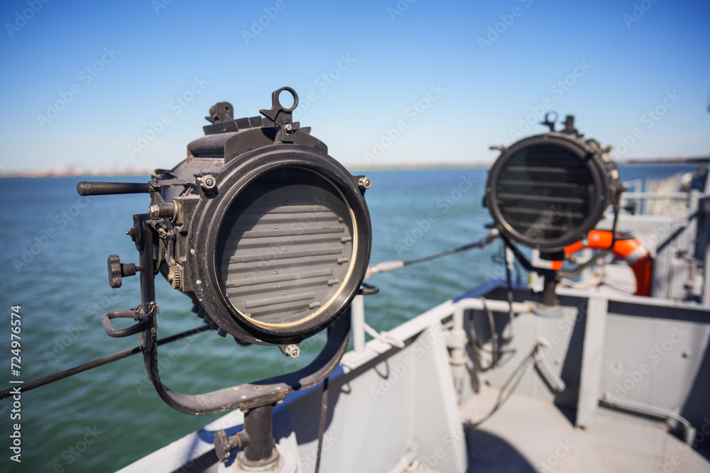 Military ship search light on the deck Military ship search light on the deck