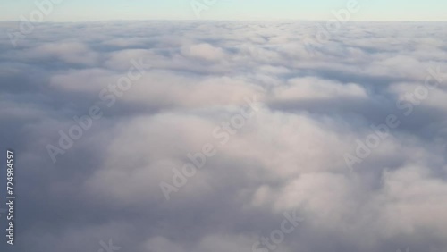 Dense thick clouds in the sky, view from the airplane window