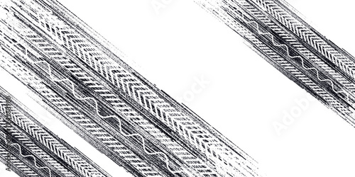 Tire tracks background for rally, drift, motocross, off-road and other auto and motorsport. Black tire marks on a white background with a worn effect and splashes of dirt.