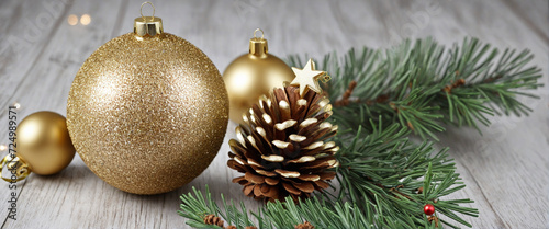 Shimmering Gold Bauble and Pine Cone, Festive Holiday Background.
