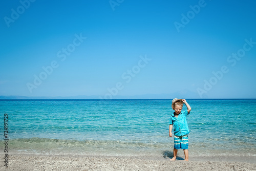 A happy child by the sea in nature weekend travel