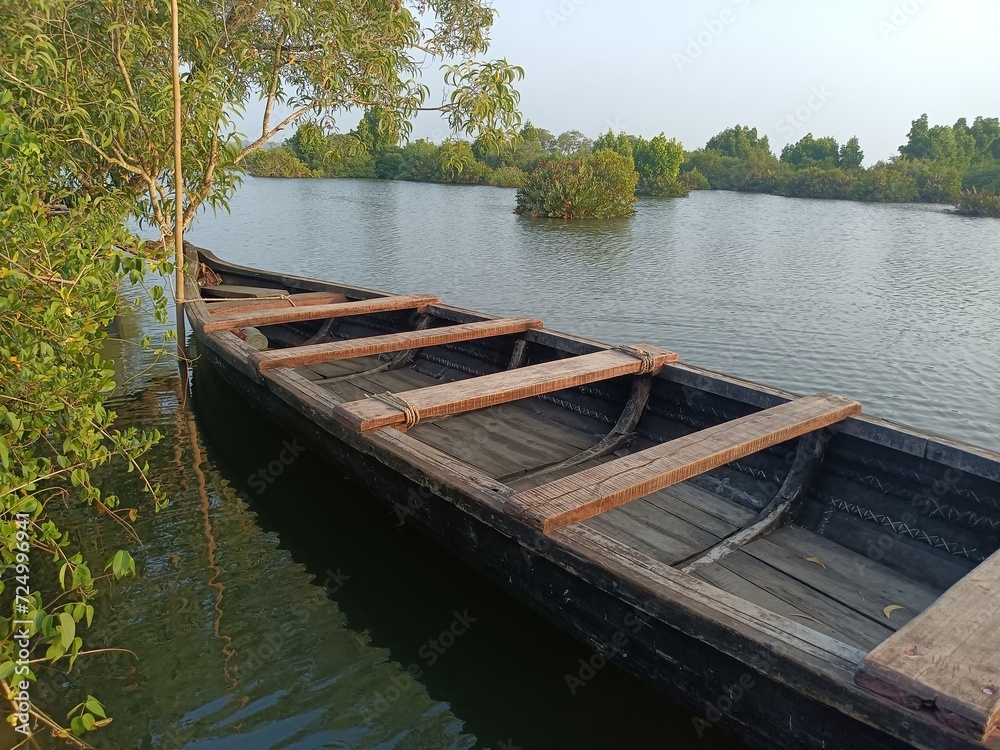 A wooden vehicle used for water transport is usually called a canoe.

