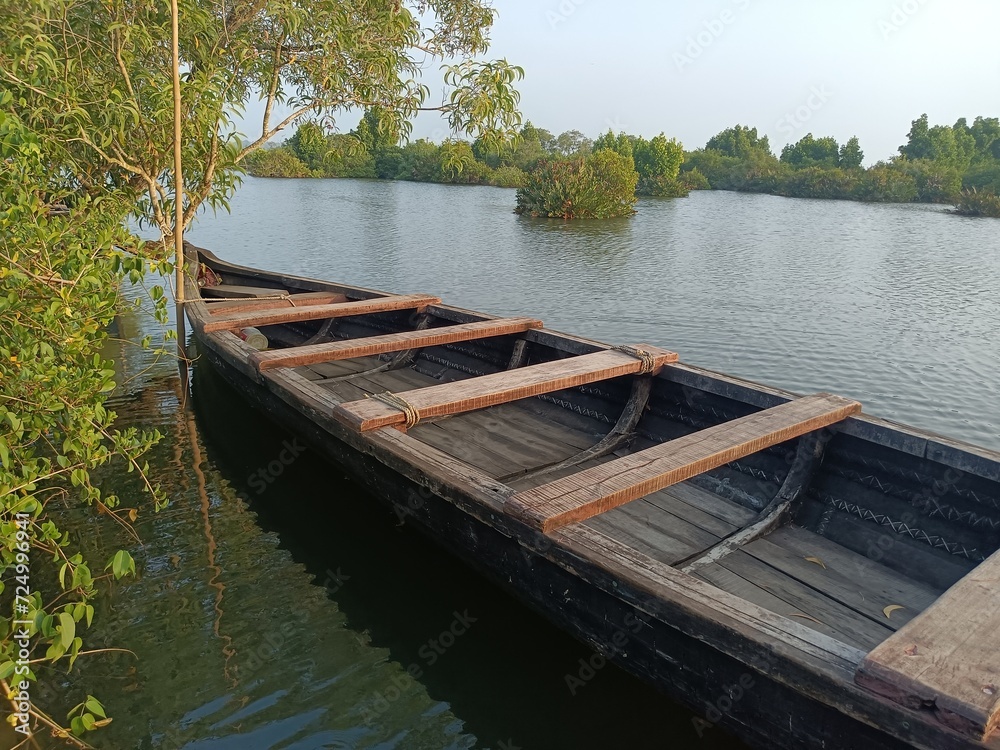 A wooden vehicle used for water transport is usually called a canoe.
A wooden vehicle used for water transport is usually called a canoe.