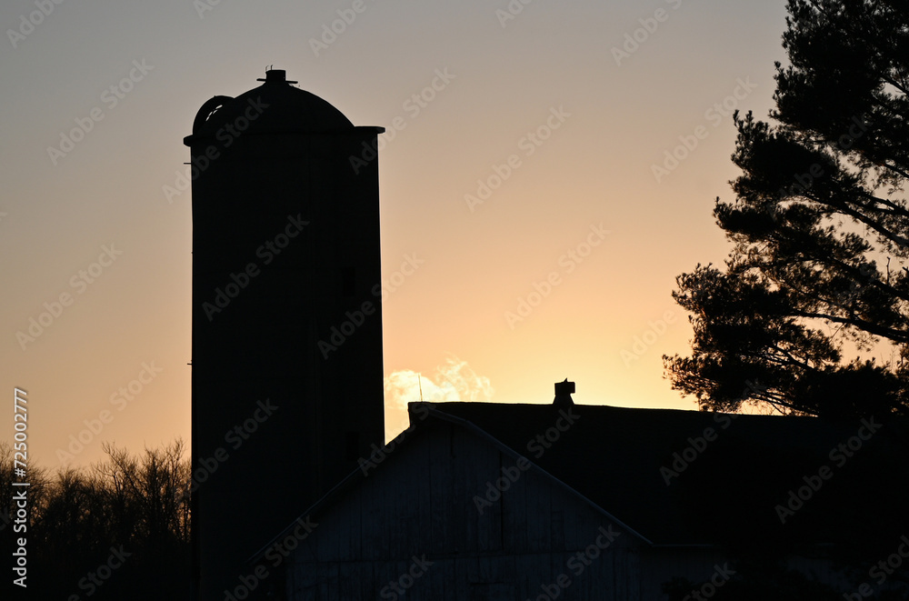 Sunset Behind Silo and Barn