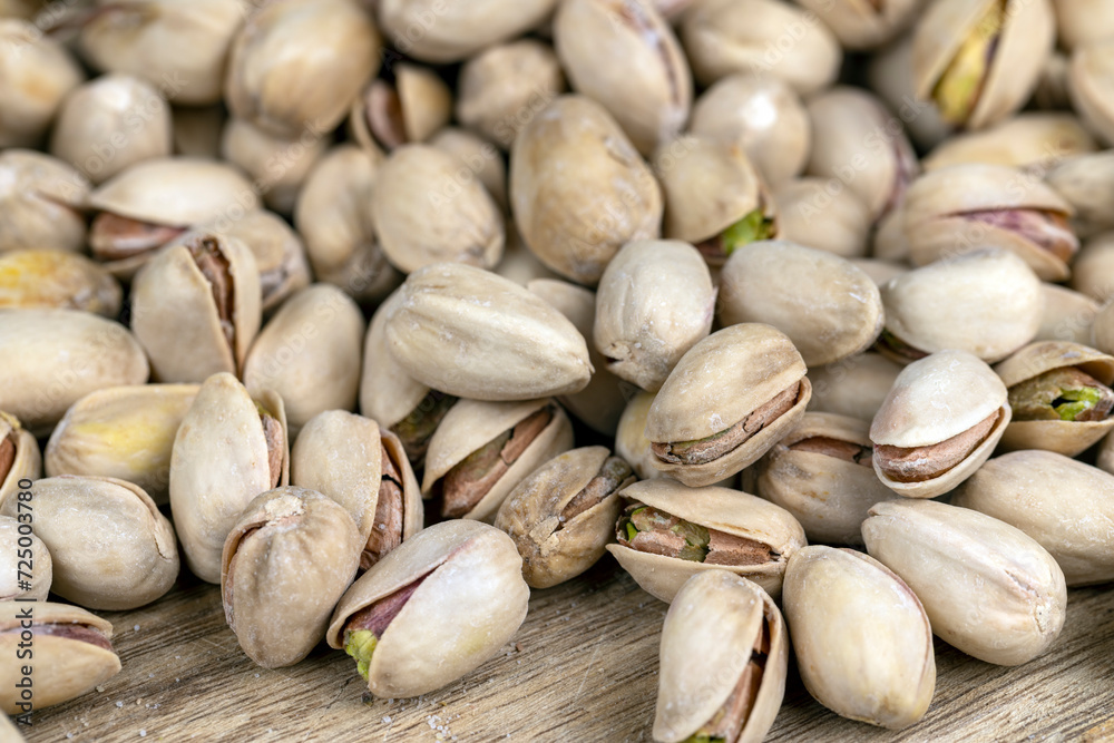 Salted fried pistachios on the table