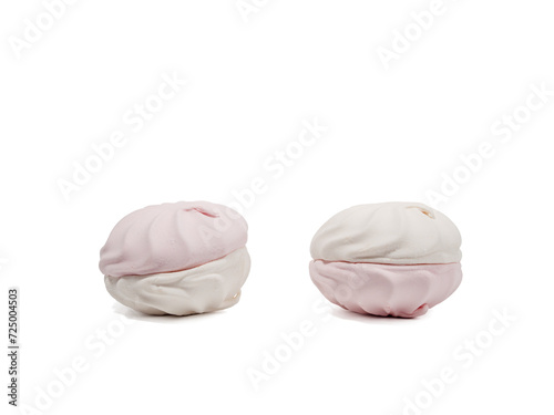 White and pink meringue cookies on a transparent PNG background. Meringue cookies close-up.