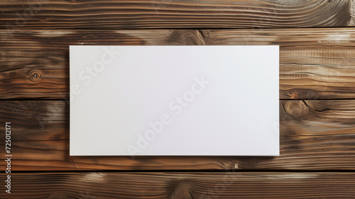 Blank paper card on wooden background. Text copy space with edit room.