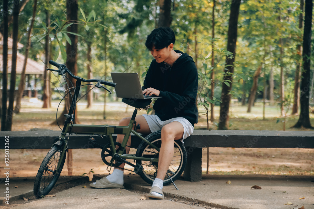 Handsome happy young man with bicycle on a city street, Active lifestyle, people concept Handsome happy young man with bicycle on a city street, Active lifestyle, people concept