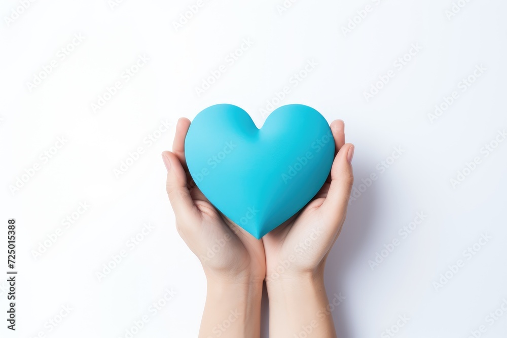 Fototapeta premium hands holding blue heart, healthcare, love, organ donation, family insurance, World Heart Day, World Health Day, World Mental Health Day, Valentine's Day