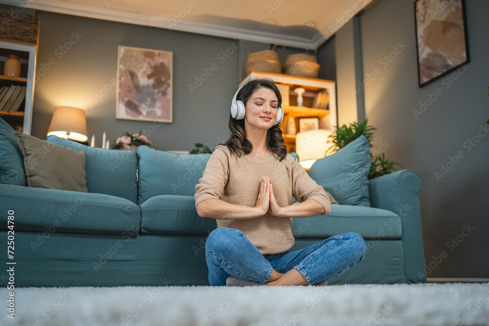 adult woman practice guided yoga meditation at home