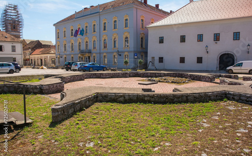 The ruins of the 17th century St Josephs Chapel in Karlovac, central Croatia. The Church of the Most Holy Trinity - Crkva Presveto Trojstvo - is seen covered in scaffolding in the background photo