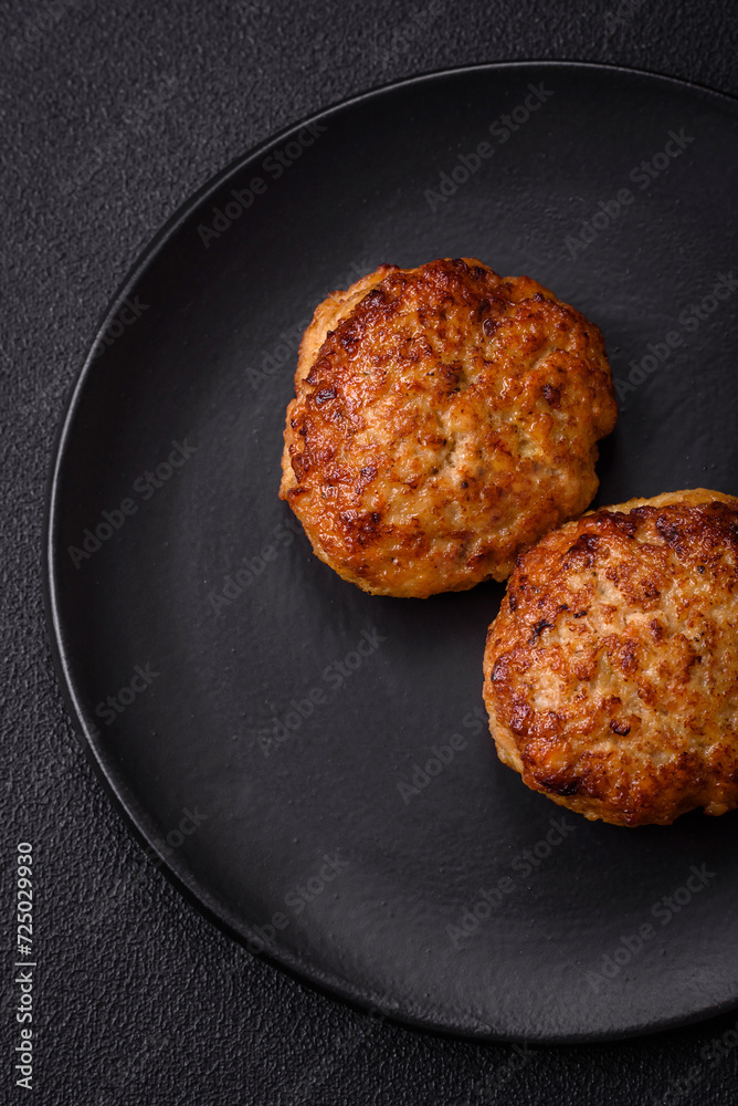 Delicious fresh fried minced fish cutlets with spices and herbs Delicious fresh fried minced fish cutlets with spices and herbs