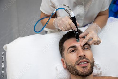 Male patient having current therapy for face
