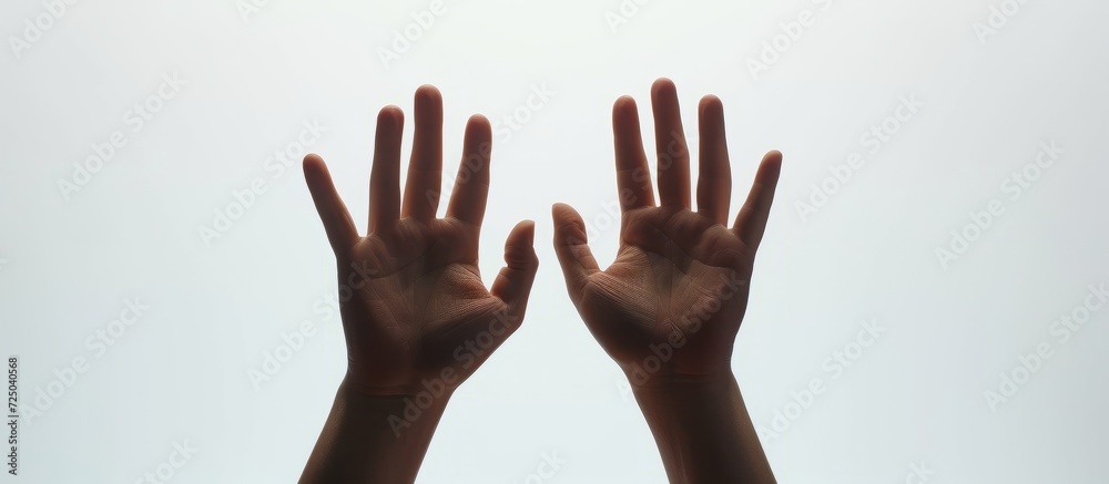 Human hand gestures displayed in a first person view against a white studio background. Human hand gestures displayed in a first person view against a white studio background.