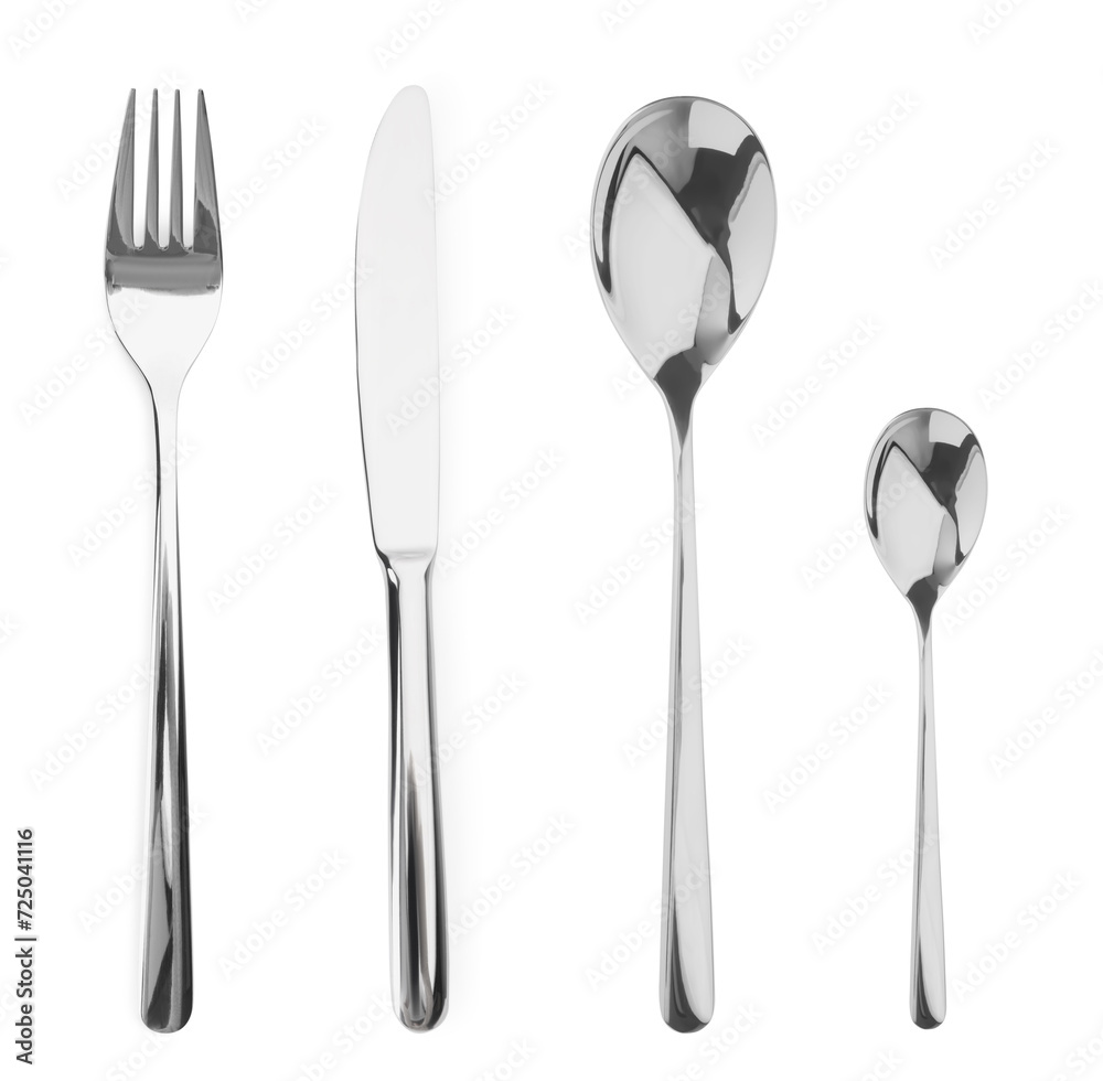 Silver fork, knife and spoons isolated on white, top view Silver fork, knife and spoons isolated on white, top view