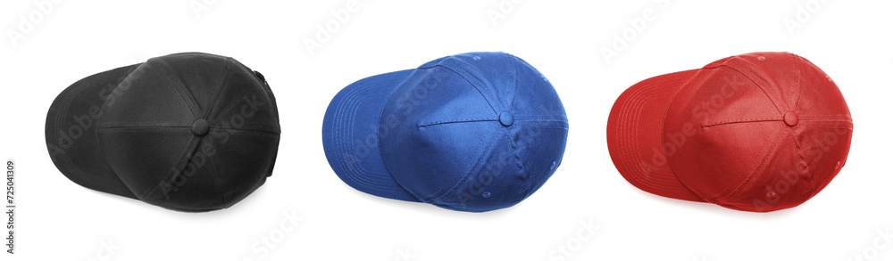 Stylish baseball caps isolated on white, top view Stylish baseball caps isolated on white, top view