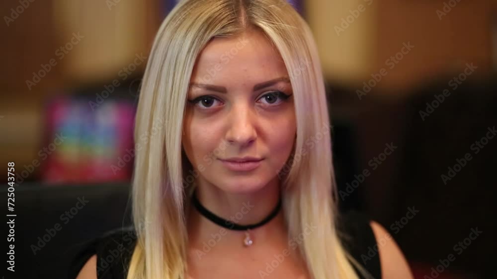 Beautiful blonde girl in playing room of casino Beautiful blonde girl in playing room of casino