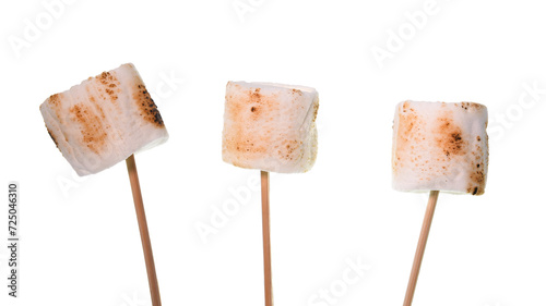 Bamboo sticks with roasted marshmallows on transparent background (PSD)
