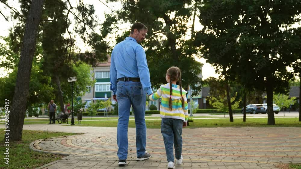 happy family, child walking with father holding hand, family walk park ...