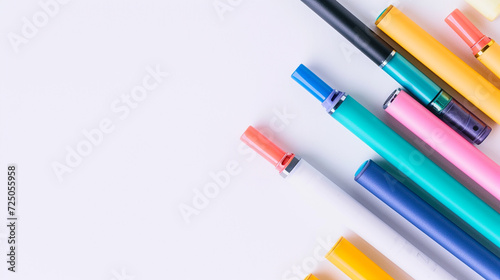 Disposable electronic cigarettes on white background, top view