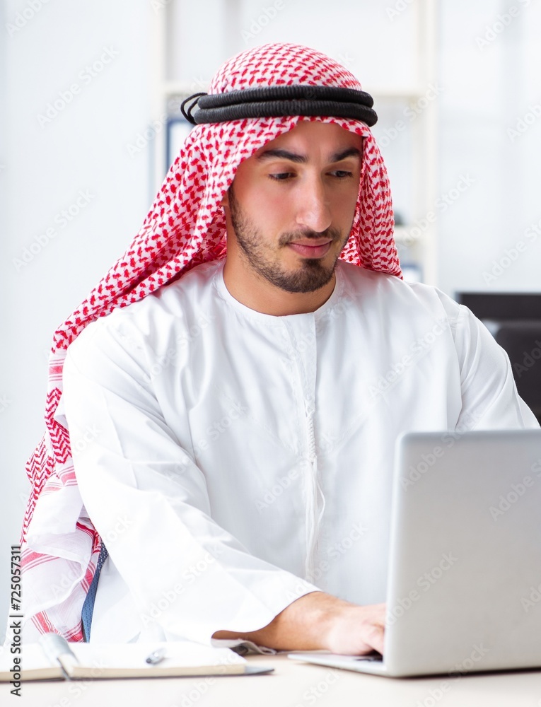 Arab businessman working in the office Arab businessman working in the office