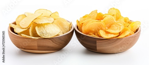 Bowl with different tasty potato chips on white background.