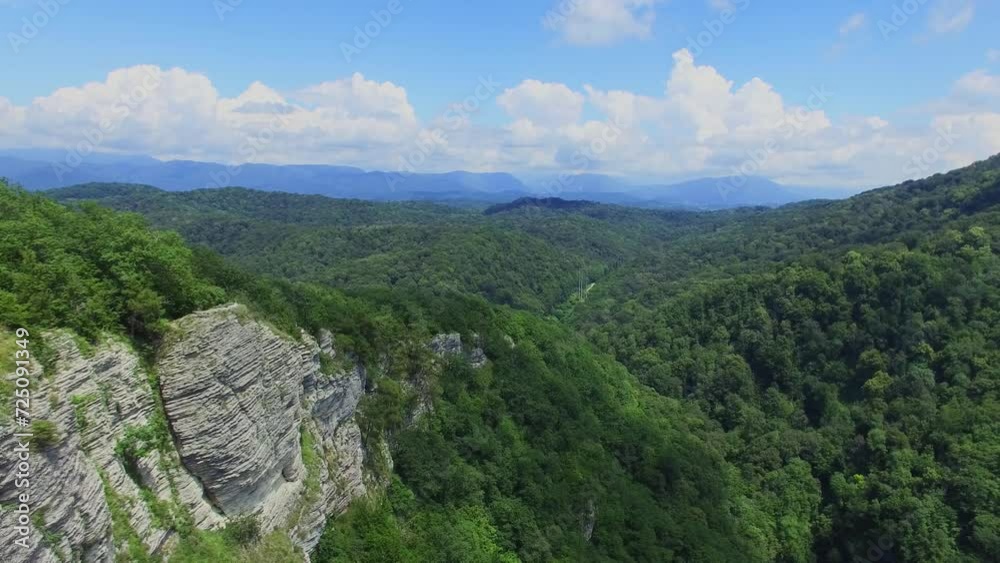 Mountain landscape with Agurskoe gorge at sunny summer day. Aerial view Mountain landscape with Agurskoe gorge at sunny summer day. Aerial view
