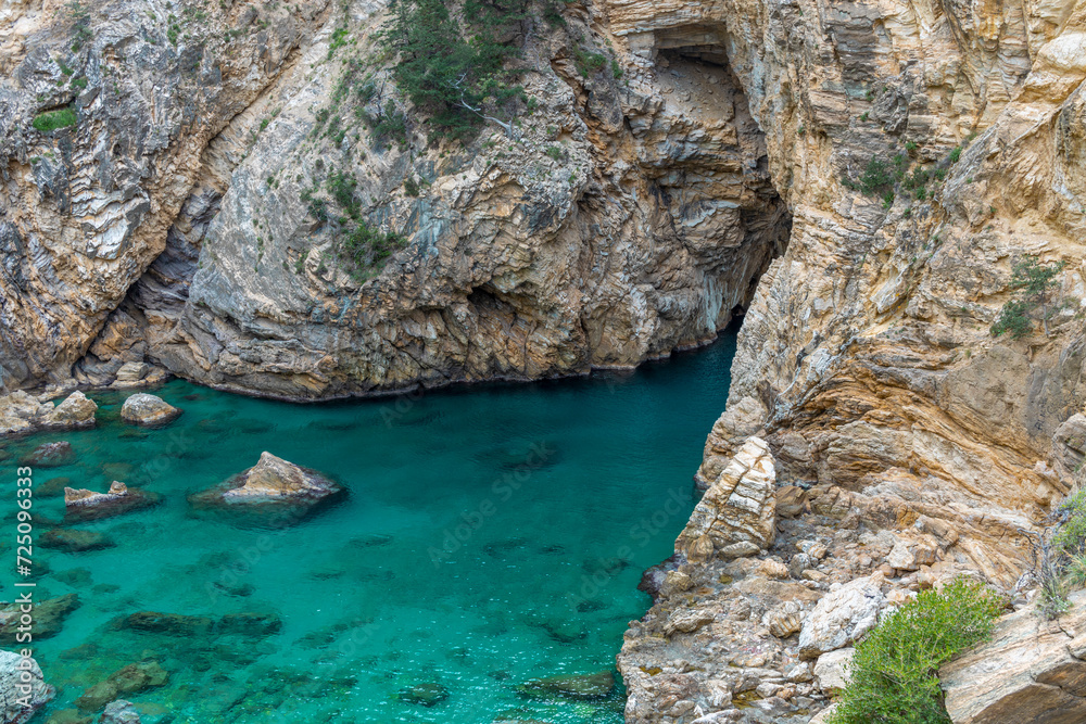 sea and rock, bay in a rock with azure water