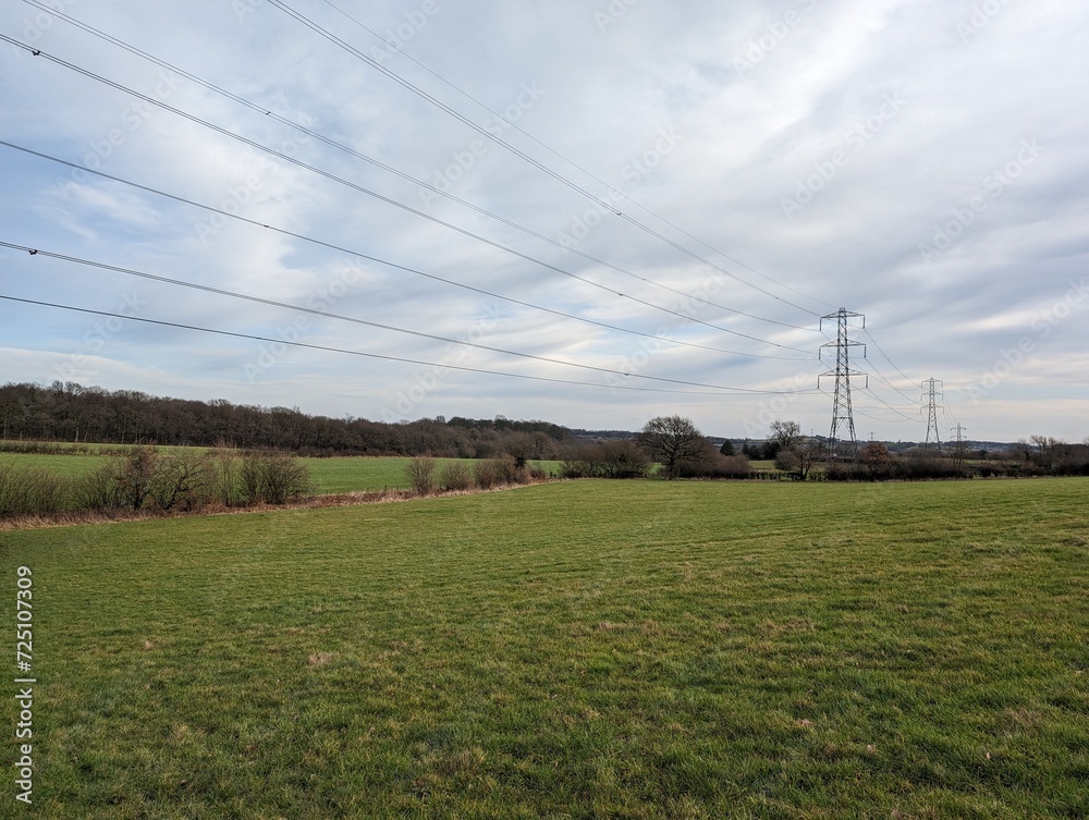 Pylons and powerlines across farmland in the United Kingdom