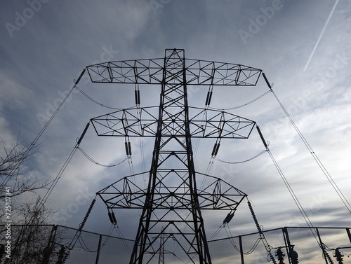 An electricity pylon on a cloudy winter day