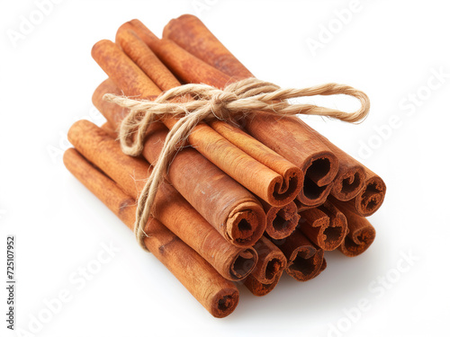 Heap of dried Cinnamon close up isolated on white background 
