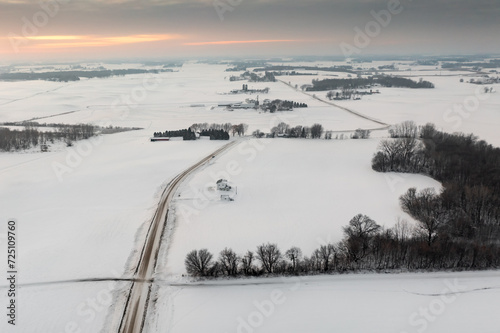 Obraz na płótnie Road Into Winter Landscape of Farms Fields and Forests w salonie