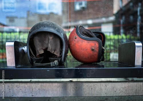 bus stop with two helmets