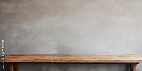 Product display template with concrete wall texture and a vacant wooden table.