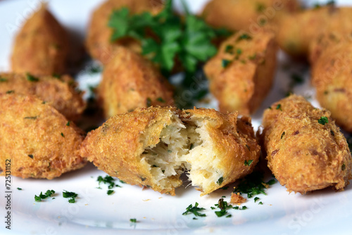 Bild auf Leinwand cod fritter fried fish meat ball typical Portuguese food fried cod